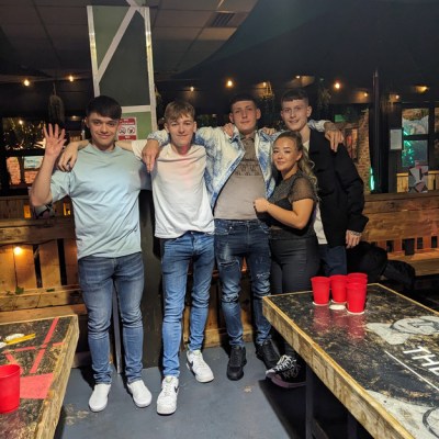 a group of people posing for the camera