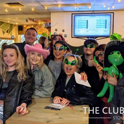 a group of people posing for the camera