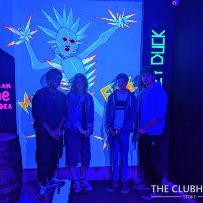 a group of people standing on a stage