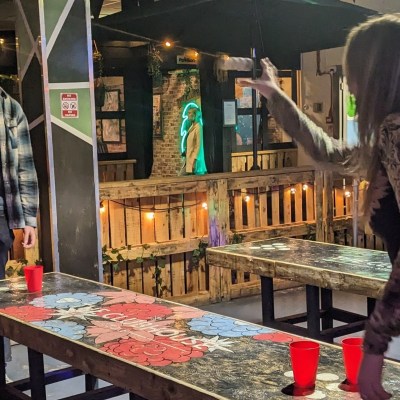 a person standing in front of a table