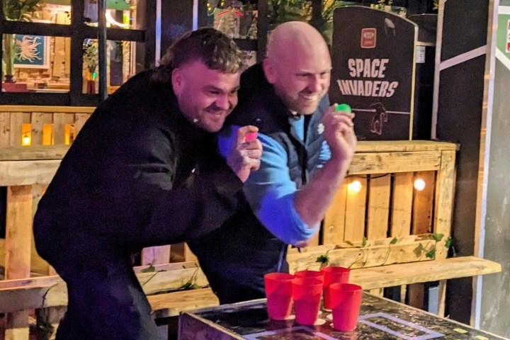 people playing beer pong