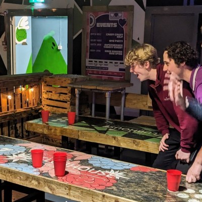 people playing beer pong