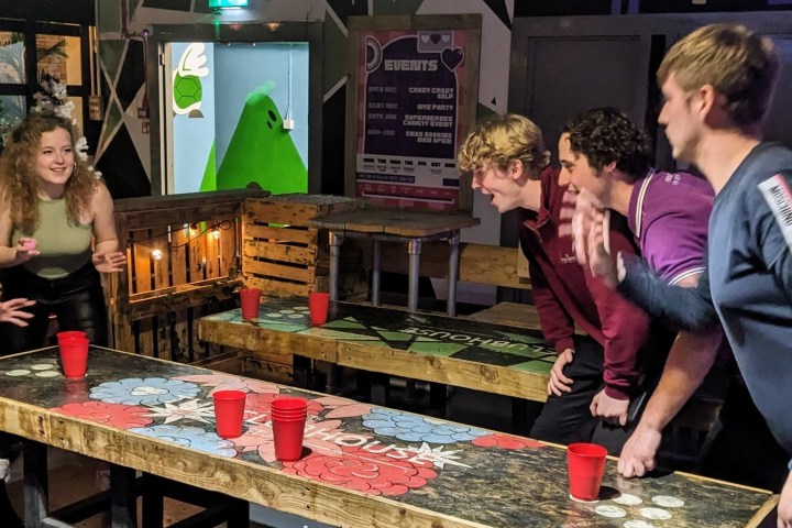 people playing beer pong