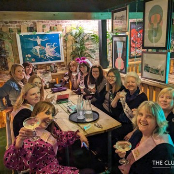 a group of people posing for the camera