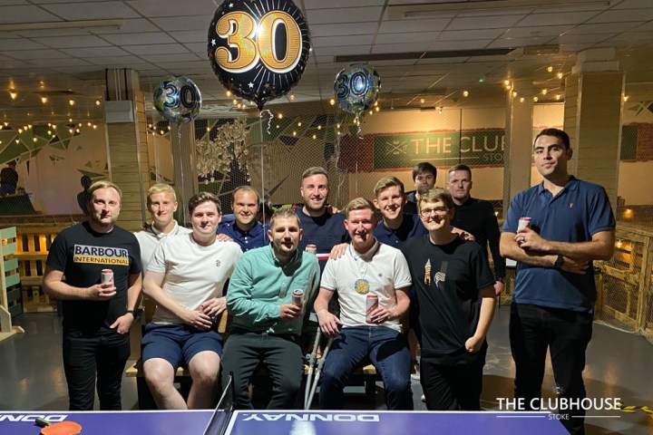 a group of people posing for the camera