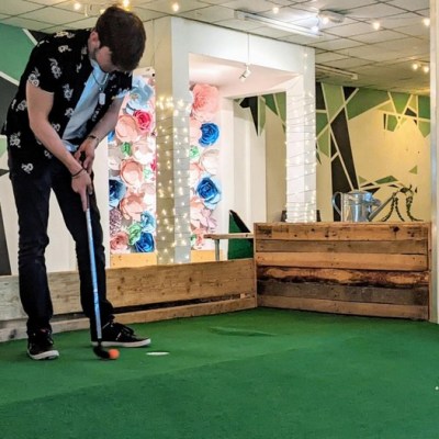 a person standing in front of a building