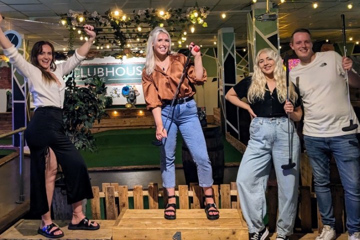 a group of people standing in a room