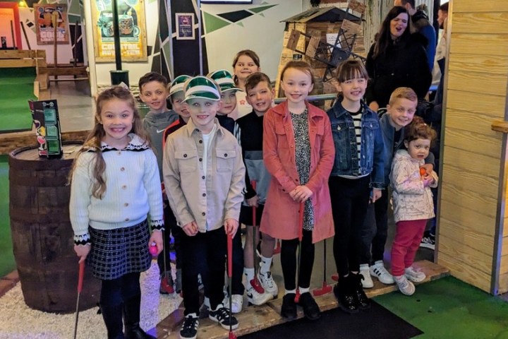 a group of people posing for a photo