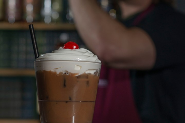 a person holding a cup