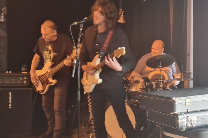 a couple of people standing on a stage