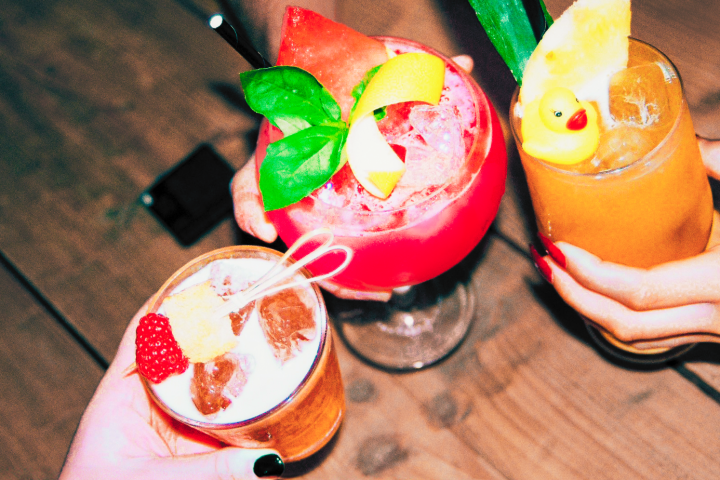 Friends cheers cocktails