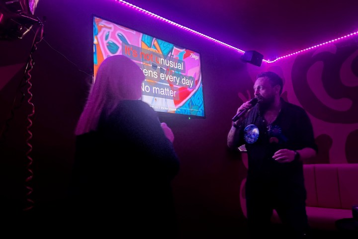a man standing in front of a stage
