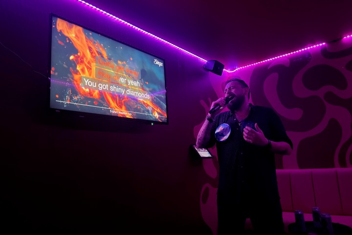 Man Singing in a Private Karaoke Room